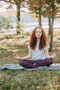 Woman journaling peacefully in nature