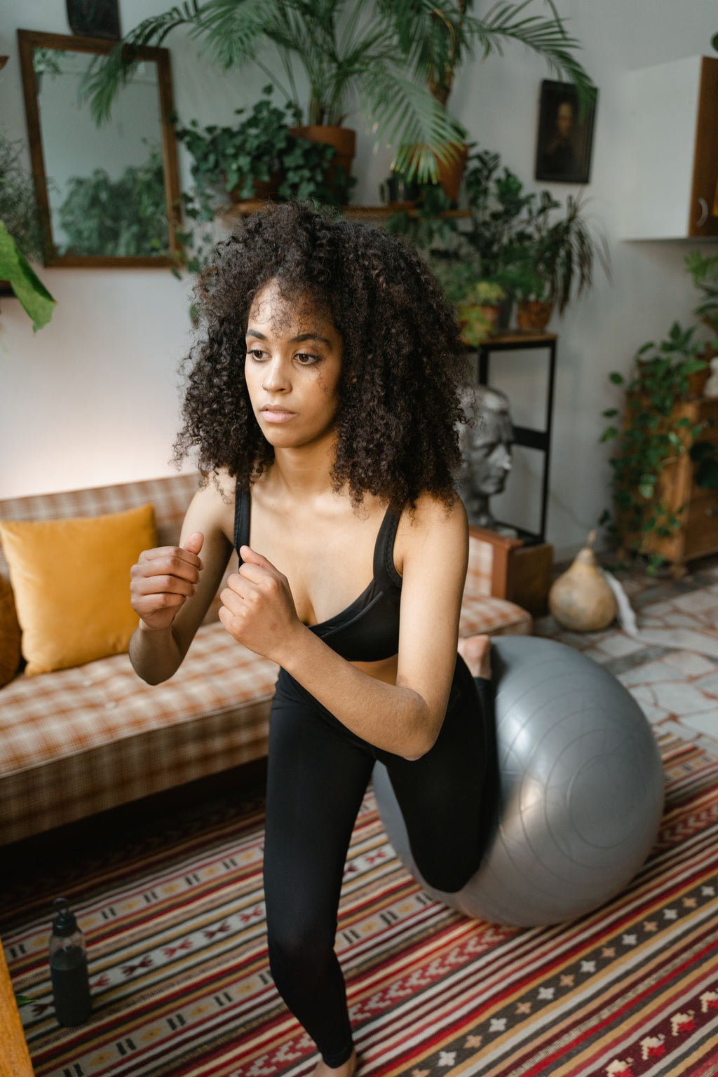 Woman doing cozy home workout